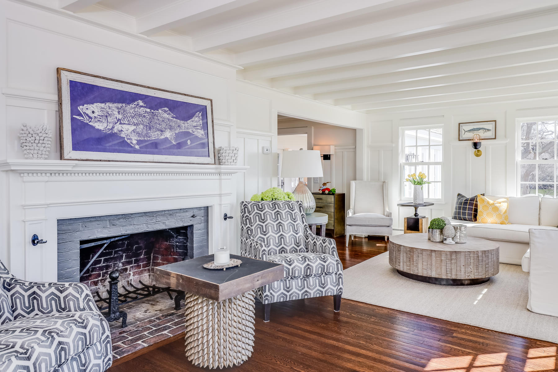 67 Quonset Road Falmouth, MA 02540 - Photo 9 of 55 a living room with furniture and a fireplace