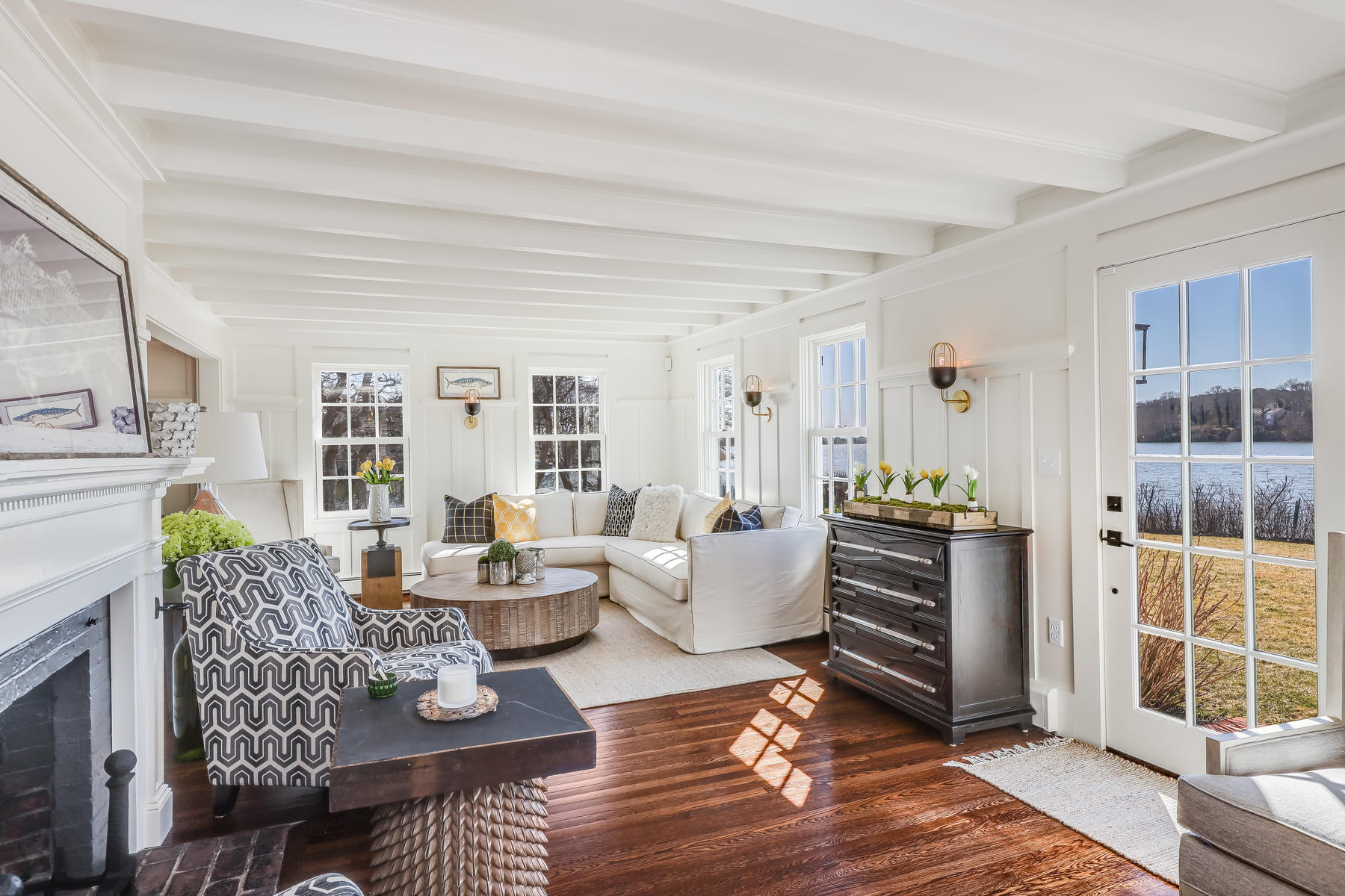 67 Quonset Road Falmouth, MA 02540 - Photo 10 of 55 a living room with furniture and large windows