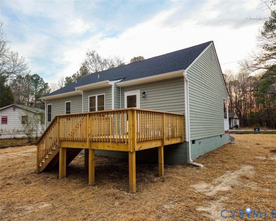 450 Wyatts Mill Road Jarratt, VA 23867 - Photo 16 of 16 a small house with a outdoor space