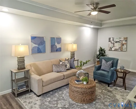 a living room with furniture and a lamp