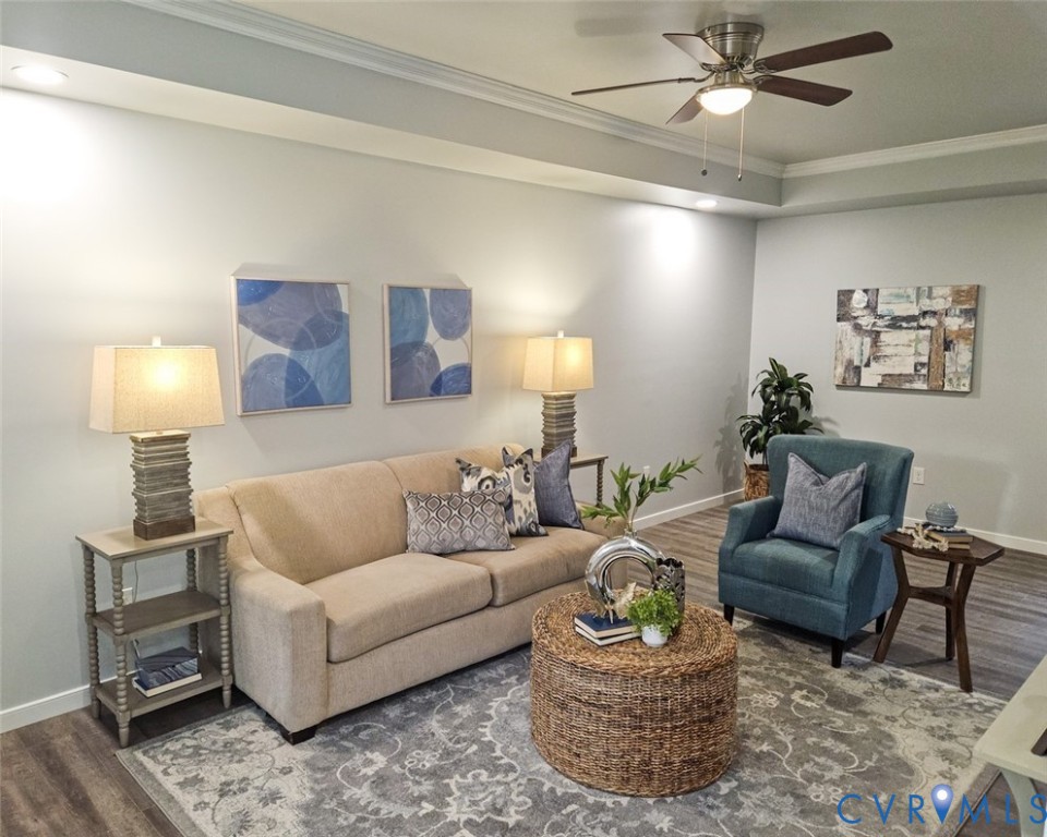 450 Wyatts Mill Road Jarratt, VA 23867 - Photo 4 of 16 a living room with furniture and a lamp