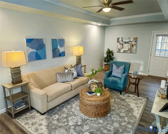 a living room with furniture and a lamp