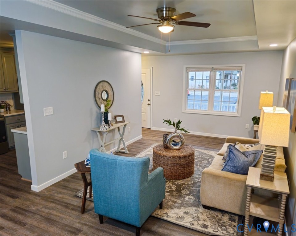 450 Wyatts Mill Road Jarratt, VA 23867 - Photo 8 of 16 a living room with furniture and a window