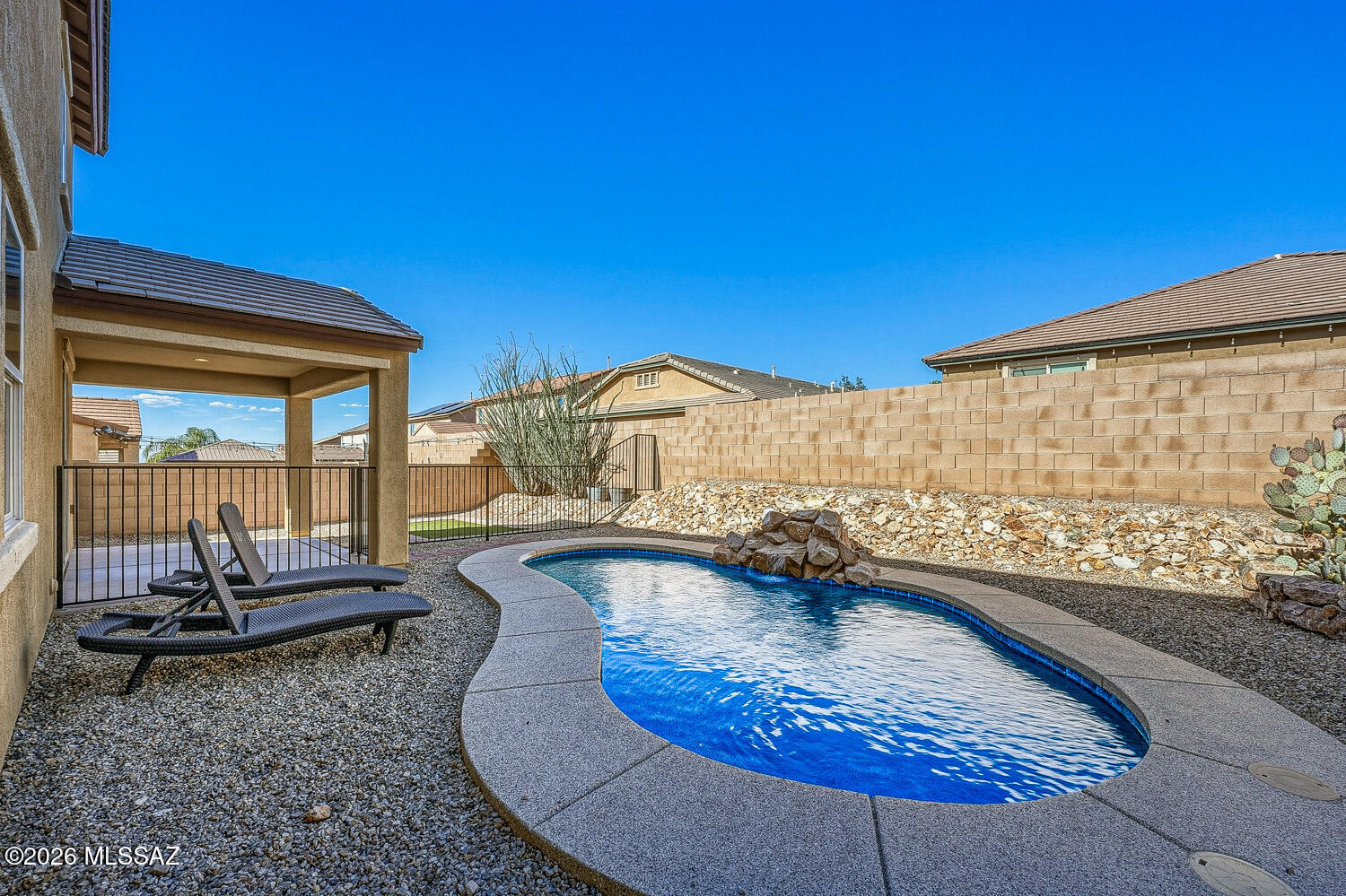 323 East Refuge Loop Vail, AZ 85641 - Photo 45 of 51 a view of swimming pool with lounge chair