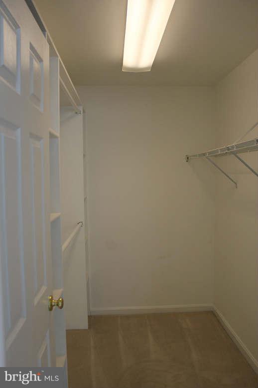 12908 Churchill Ridge Circle, Unit 4F Germantown, MD 20874 - Photo 17 of 18 Master Bedroom Closet