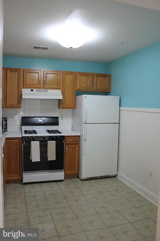 12908 Churchill Ridge Circle, Unit 4F Germantown, MD 20874 - Photo 5 of 18 Kitchen