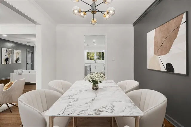 a dining room with furniture and window