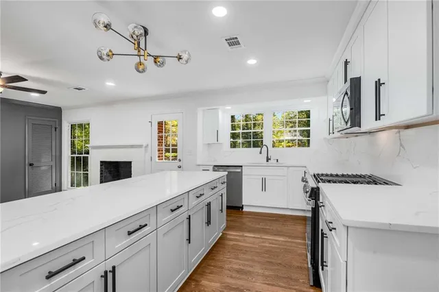 a kitchen with lot of counter top space