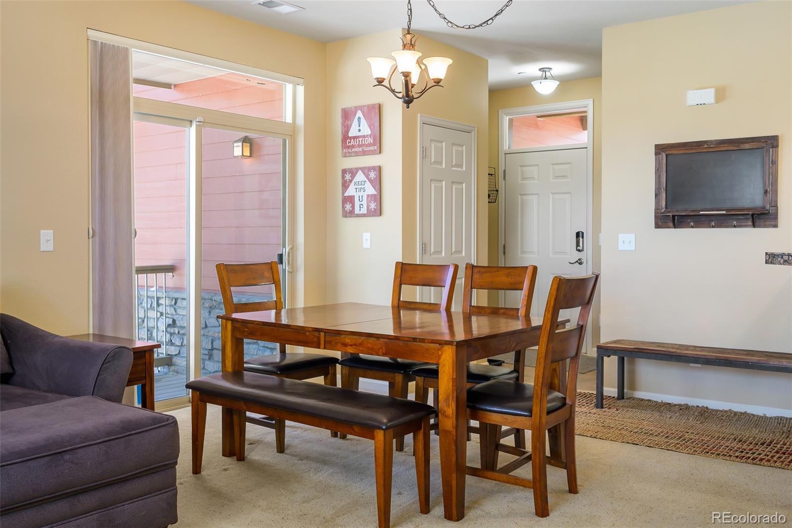 180 County Road, Unit 1 Fraser, CO 80442 - Photo 12 of 37 a view of a livingroom with furniture and a flat screen tv