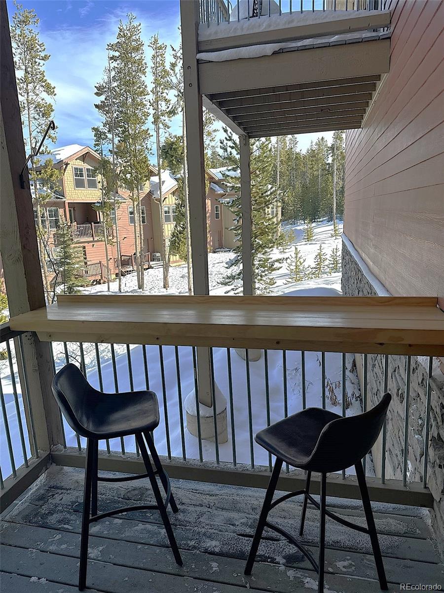 180 County Road, Unit 1 Fraser, CO 80442 - Photo 15 of 37 a view of a chairs on the roof deck