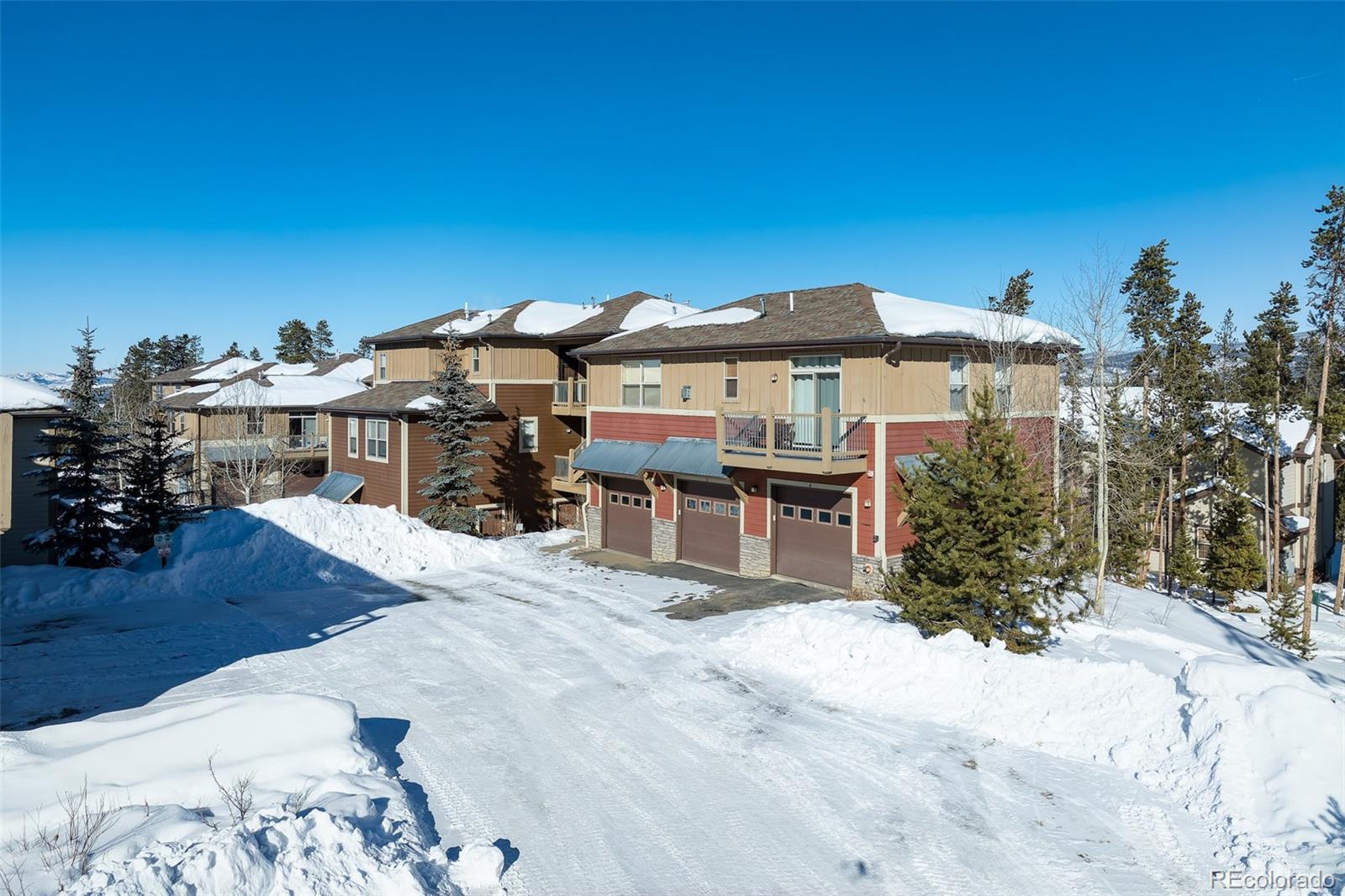 180 County Road, Unit 1 Fraser, CO 80442 - Photo 3 of 37 a view of a house with a snow in the background