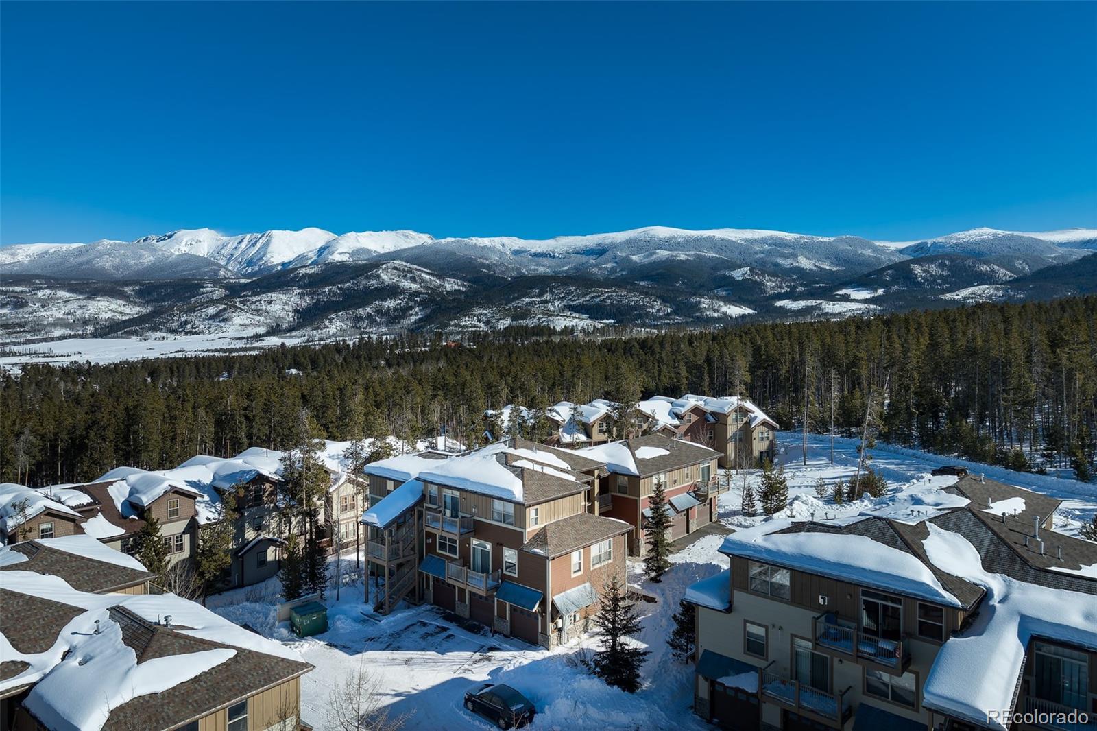 180 County Road, Unit 1 Fraser, CO 80442 - Photo 5 of 37 a terrace with outdoor seating and city view