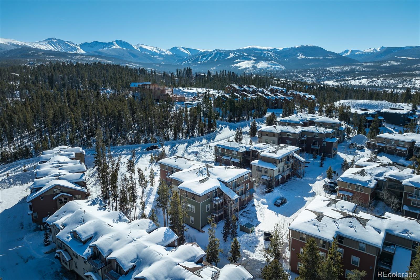 180 County Road, Unit 1 Fraser, CO 80442 - Photo 6 of 37 a terrace with outdoor seating and city view