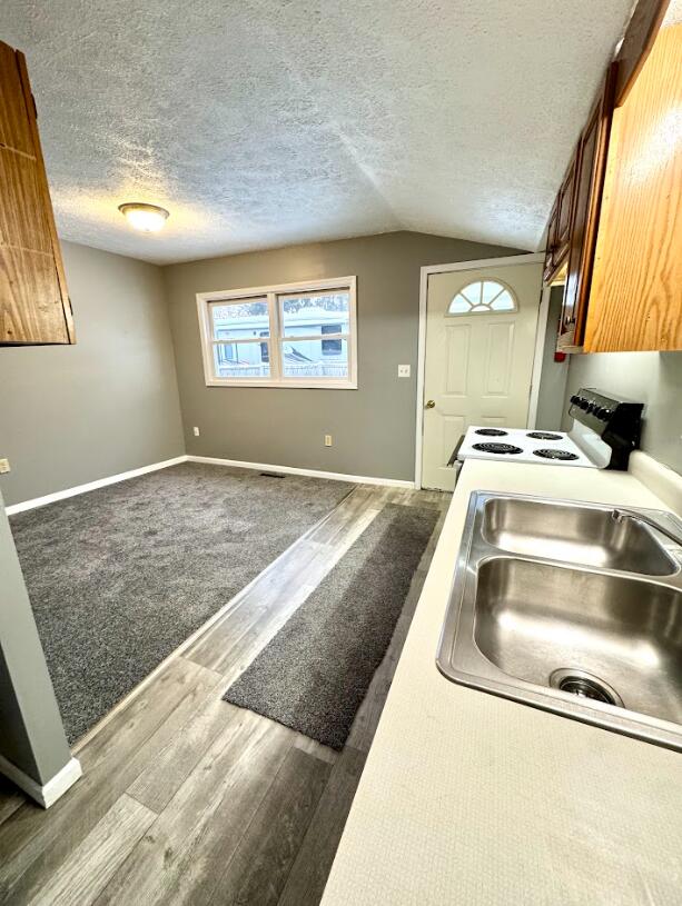 46 Grove Galesburg, MI 49053 - Photo 7 of 26 Living Room/Kitchen Unit 3