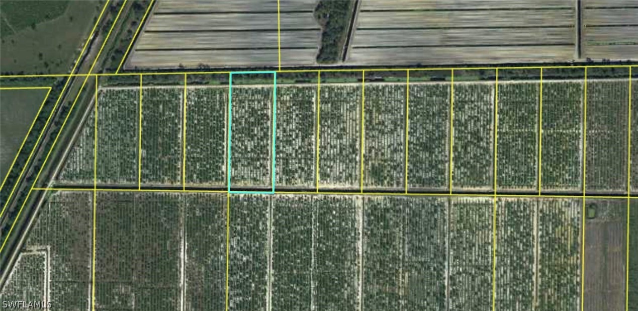 6475 7th Road LaBelle, FL 33935 - Photo 7 of 7 a view of a backyard