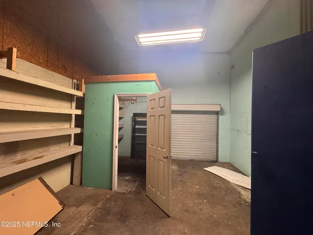 a view of room with walk in closet