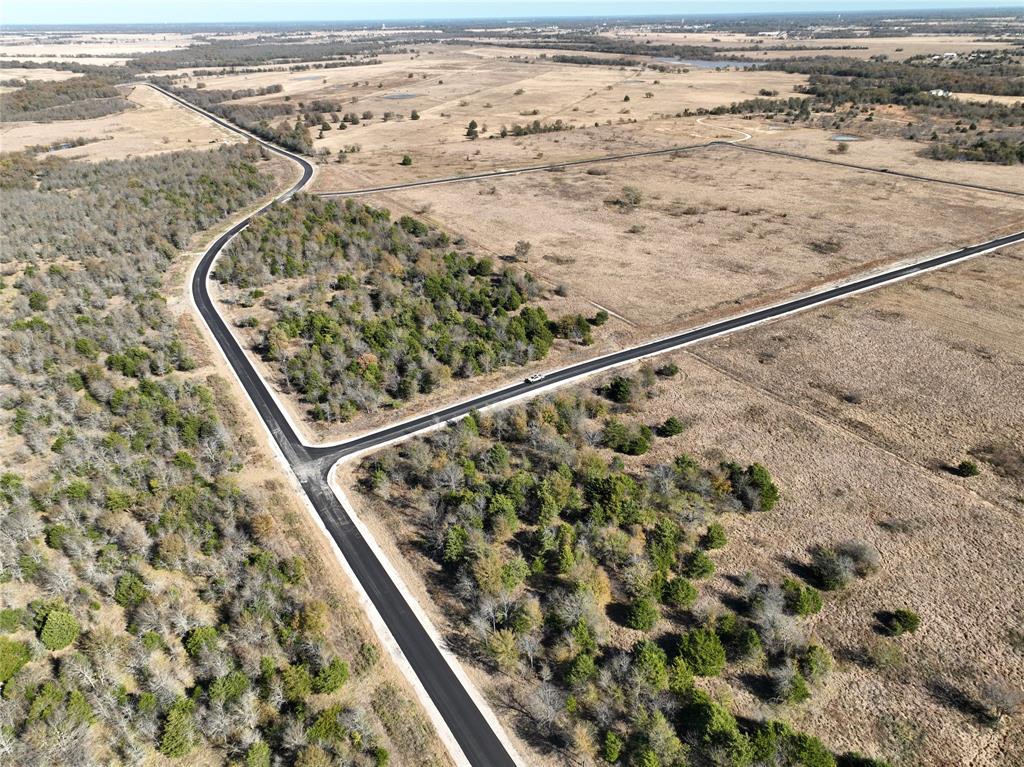 Tbd Tbd Channing Lane Wills Point, TX 75169 - Photo 3 of 3 a view of wooden floor with a ocean view