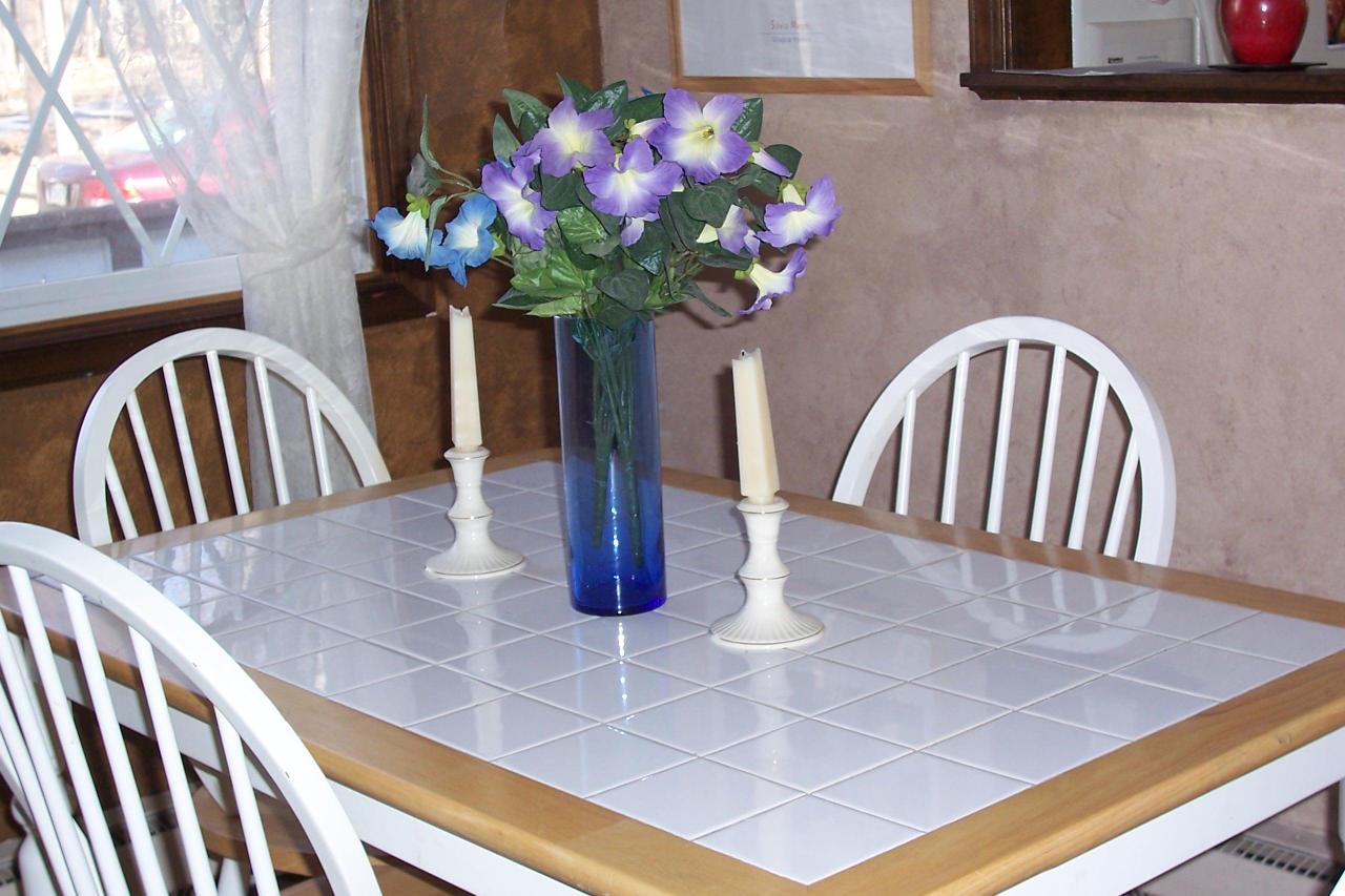 406 Deer Run Road Pocono Summit, PA 18346 - Photo 7 of 8 a view of kitchen with furniture and flowers