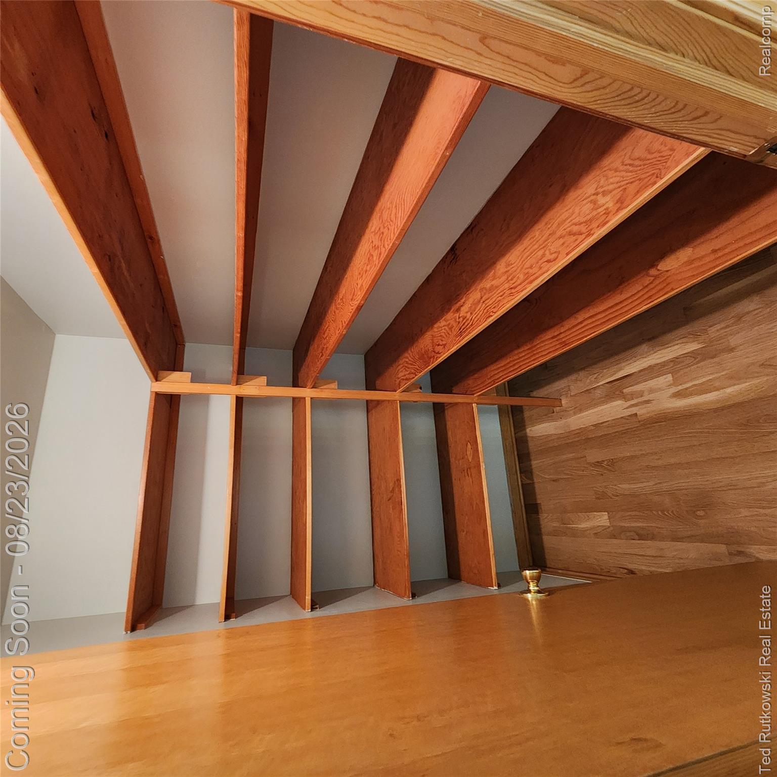 12350 Masters Road Memphis, MI 48041 - Photo 38 of 45 Built-in shelving with wood-finish construction