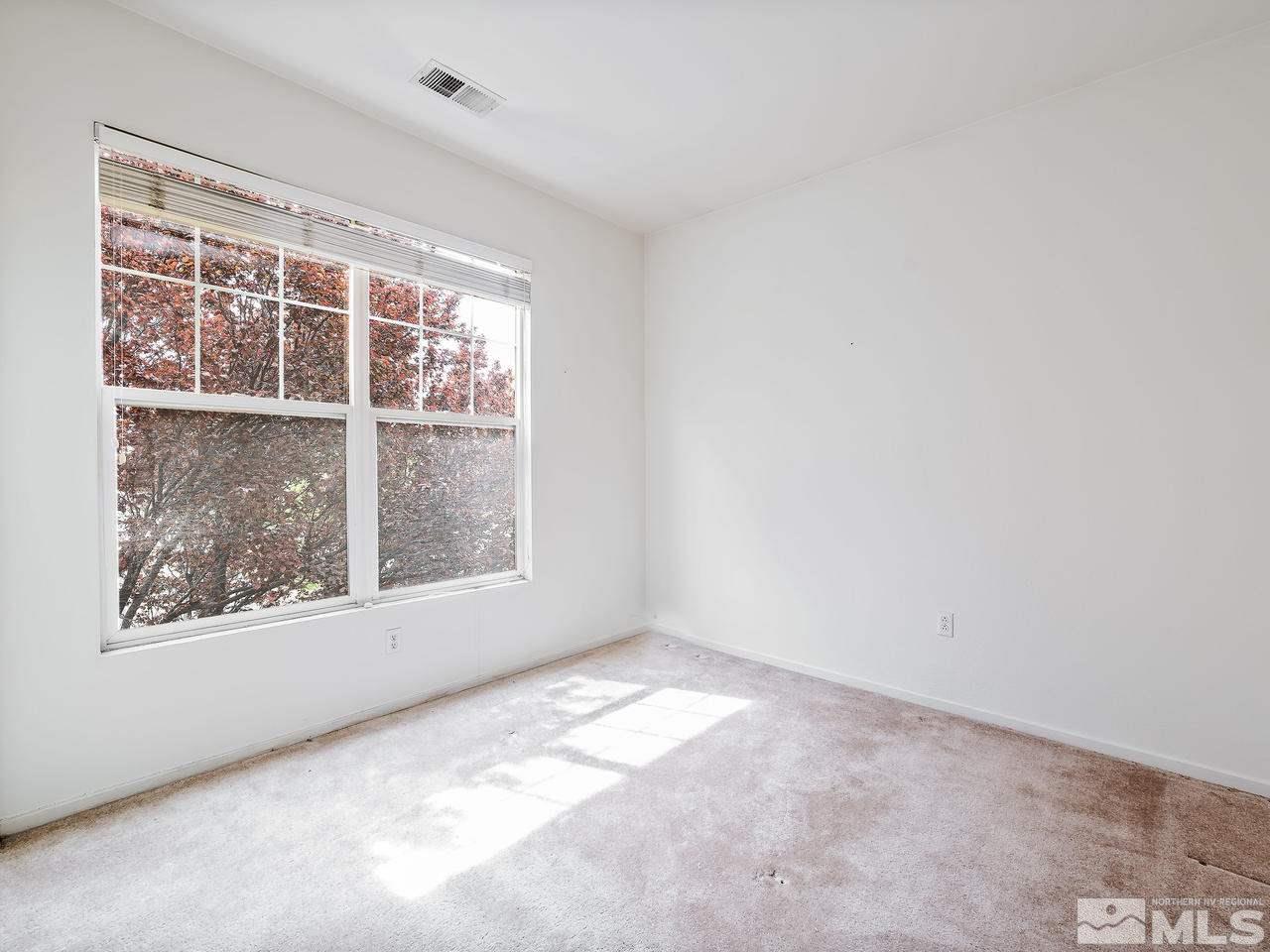 1287 Tule Drive Reno, NV 89521 - Photo 25 of 32 an empty room with a window