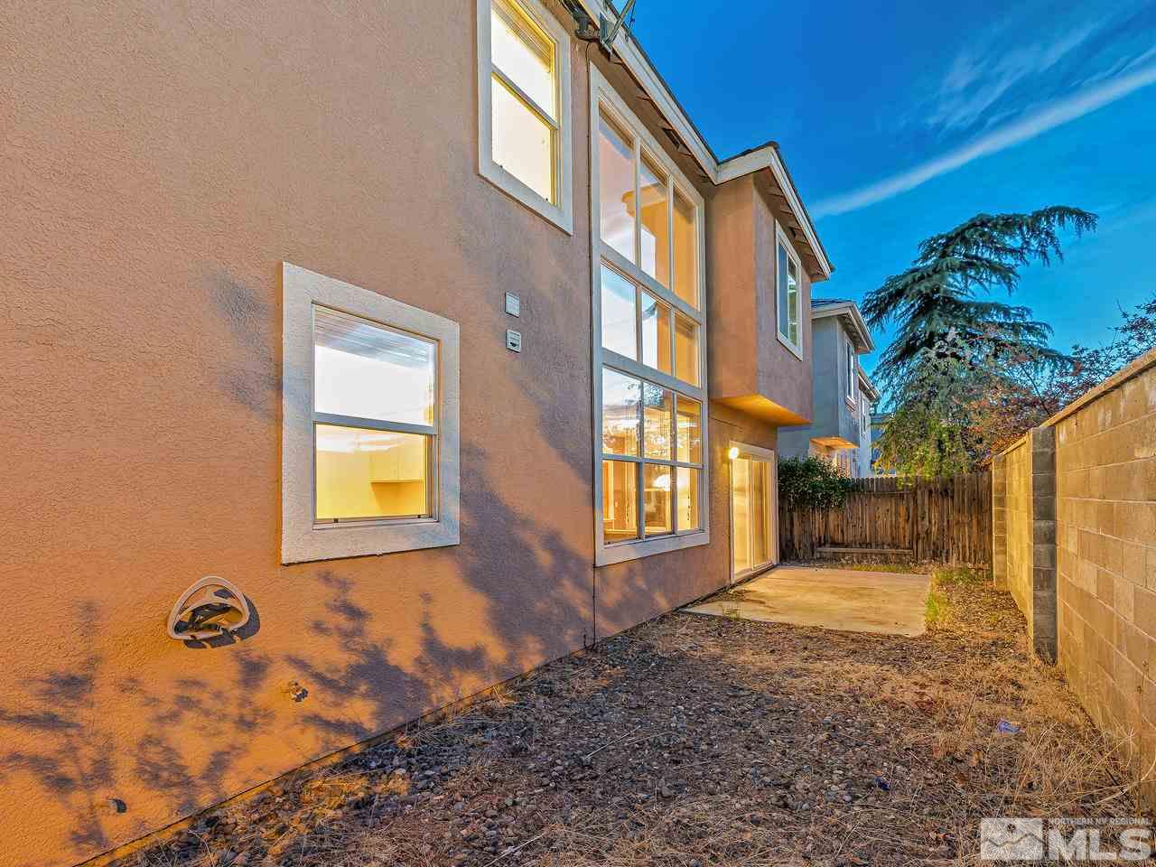 1287 Tule Drive Reno, NV 89521 - Photo 27 of 32 a view of a house with a backyard