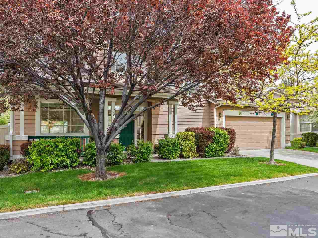 1287 Tule Drive Reno, NV 89521 - Photo 30 of 32 a front view of a house with a yard