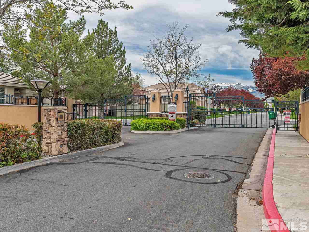 1287 Tule Drive Reno, NV 89521 - Photo 31 of 32 a view of a street with a houses