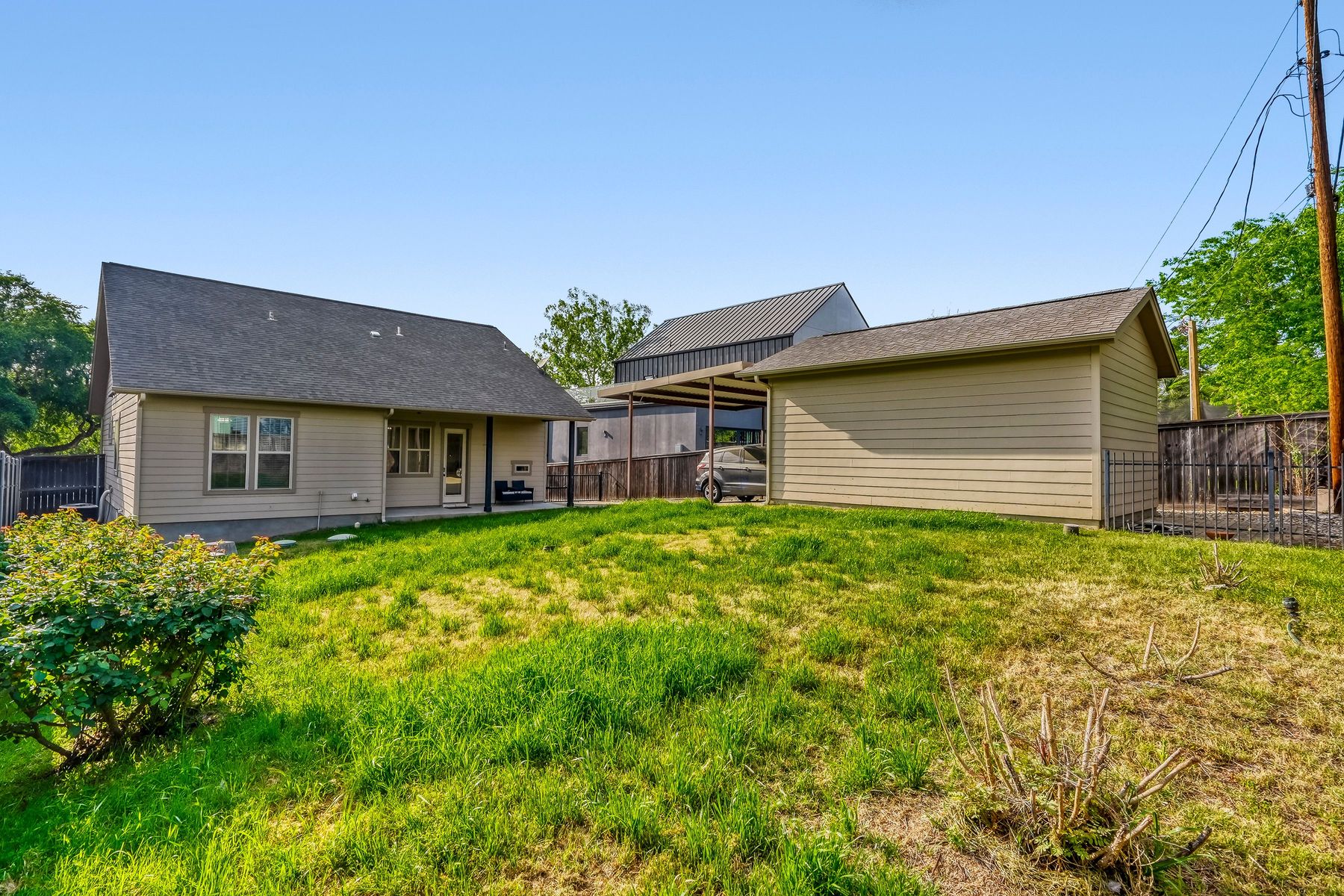 2913 Chisholm Trail Austin, TX 78734 - Photo 18 of 24 a front view of a house with a garden