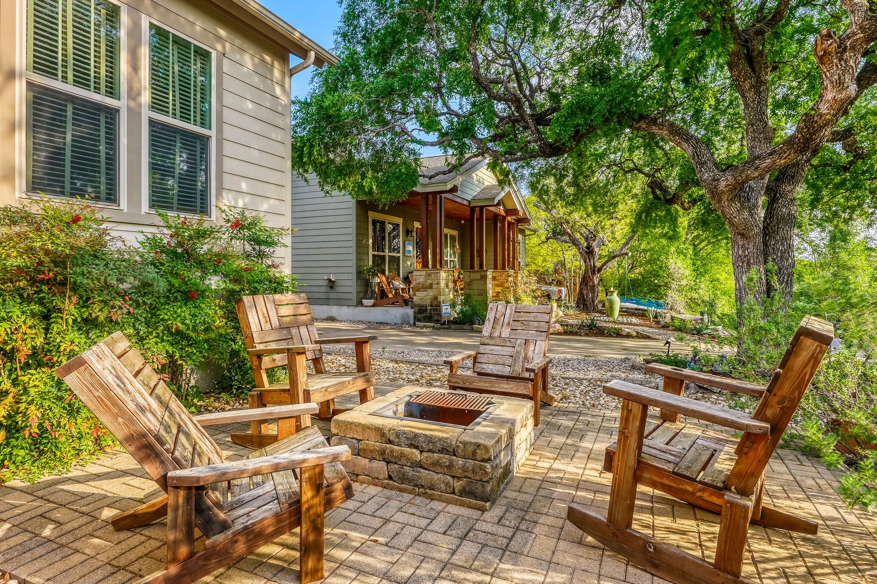 2913 Chisholm Trail Austin, TX 78734 - Photo 4 of 24 a view of a chairs and table in backyard of the house