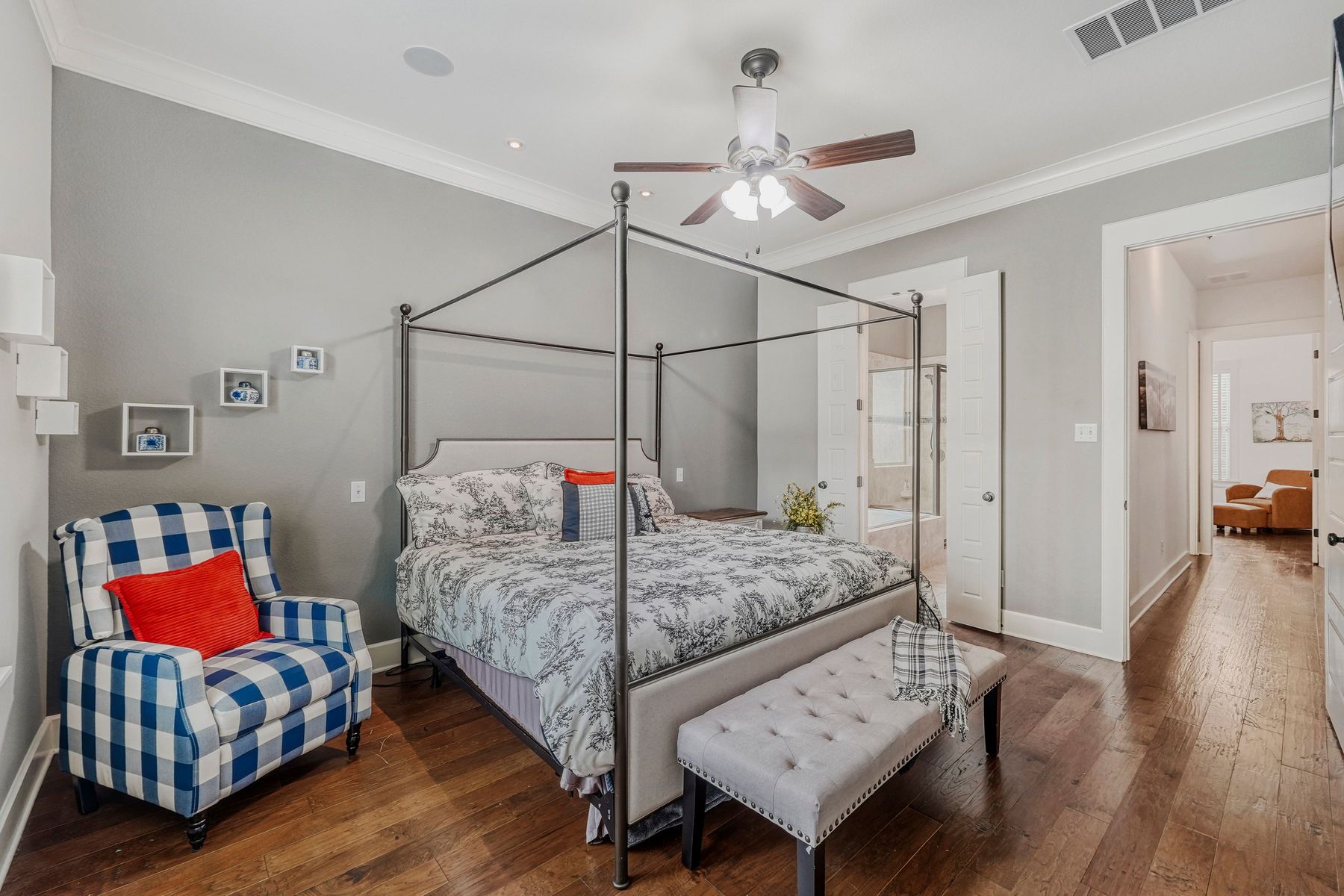 2913 Chisholm Trail Austin, TX 78734 - Photo 10 of 24 a bedroom with a bed and wooden floor