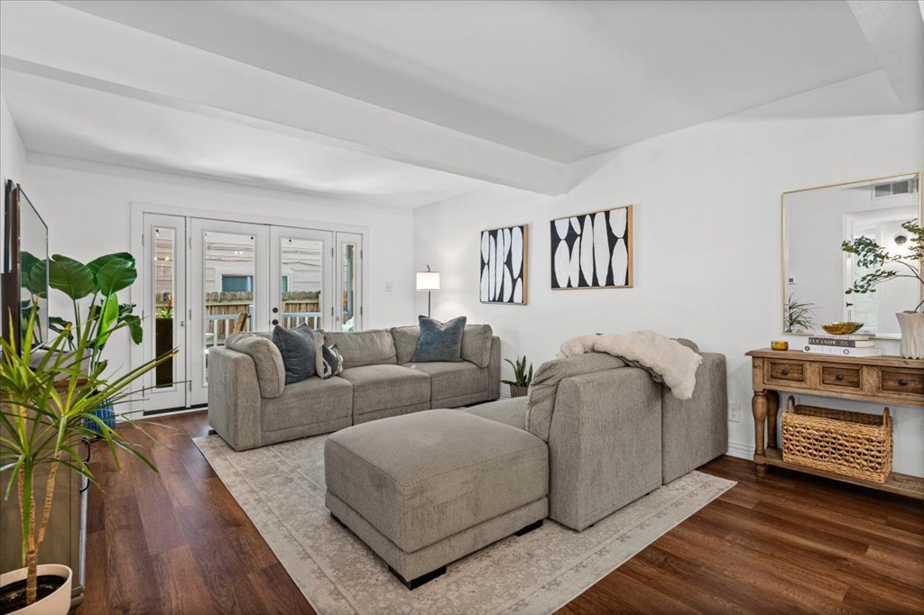 2208 Enfield Road, Unit 107 Austin, TX 78703 - Photo 11 of 35 a living room with furniture and a potted plant
