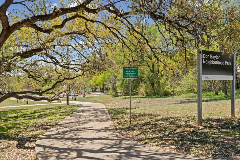 2208 Enfield Road, Unit 107 Austin, TX 78703 - Photo 30 of 35 a view of a yard with plants and trees