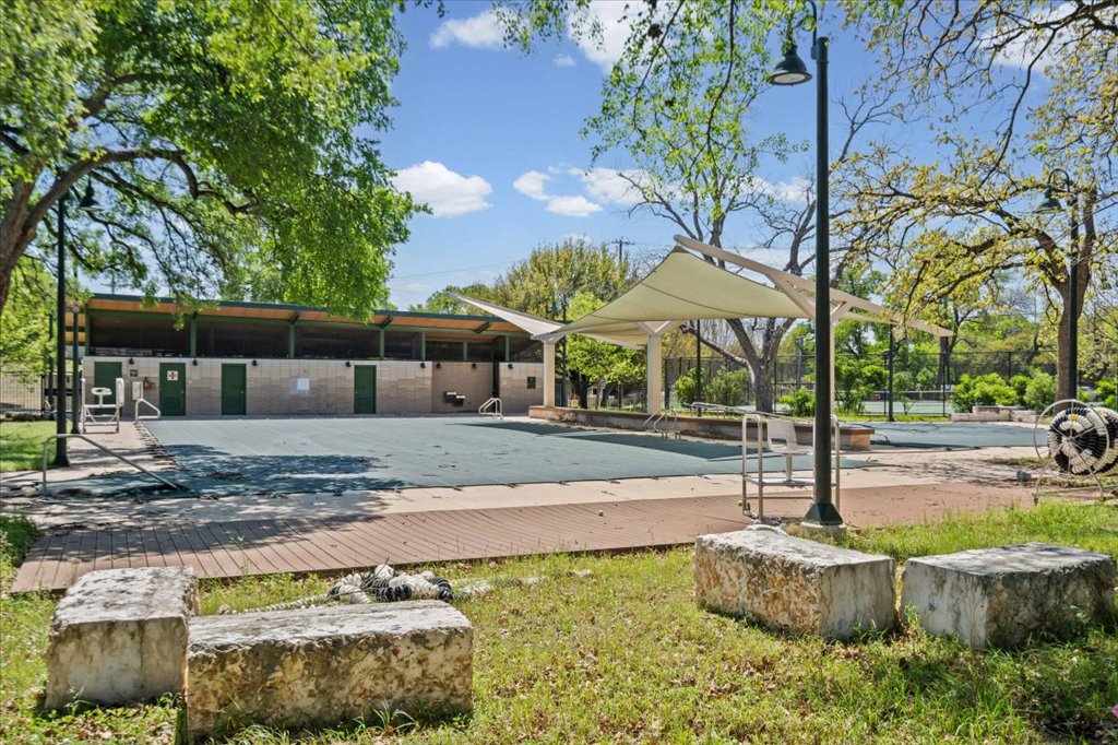 2208 Enfield Road, Unit 107 Austin, TX 78703 - Photo 32 of 35 a view of a yard with plants and a fountain