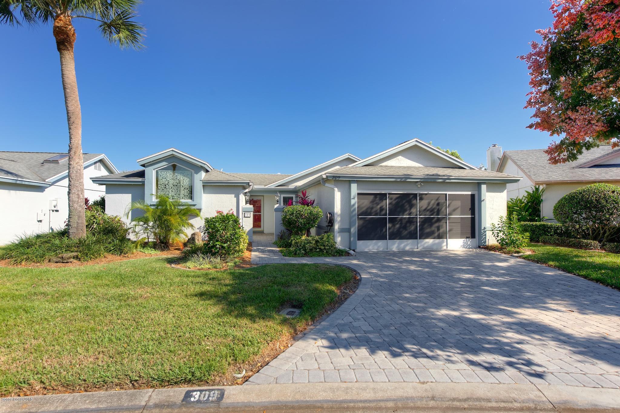 309 Pine Ridge Lane Melbourne, FL 32940 - Photo 2 of 26 Front