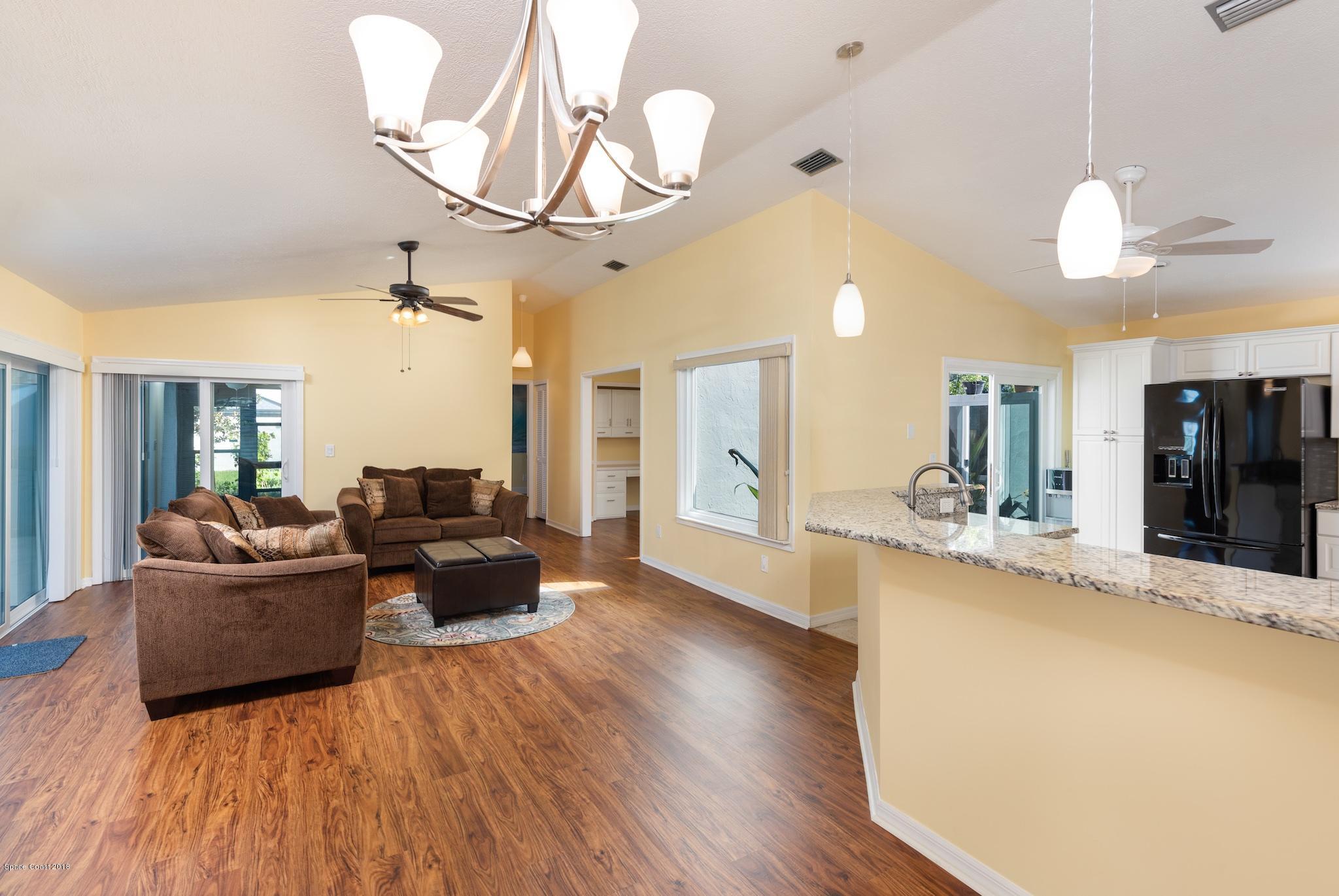 309 Pine Ridge Lane Melbourne, FL 32940 - Photo 4 of 26 Dining Room to Living Room