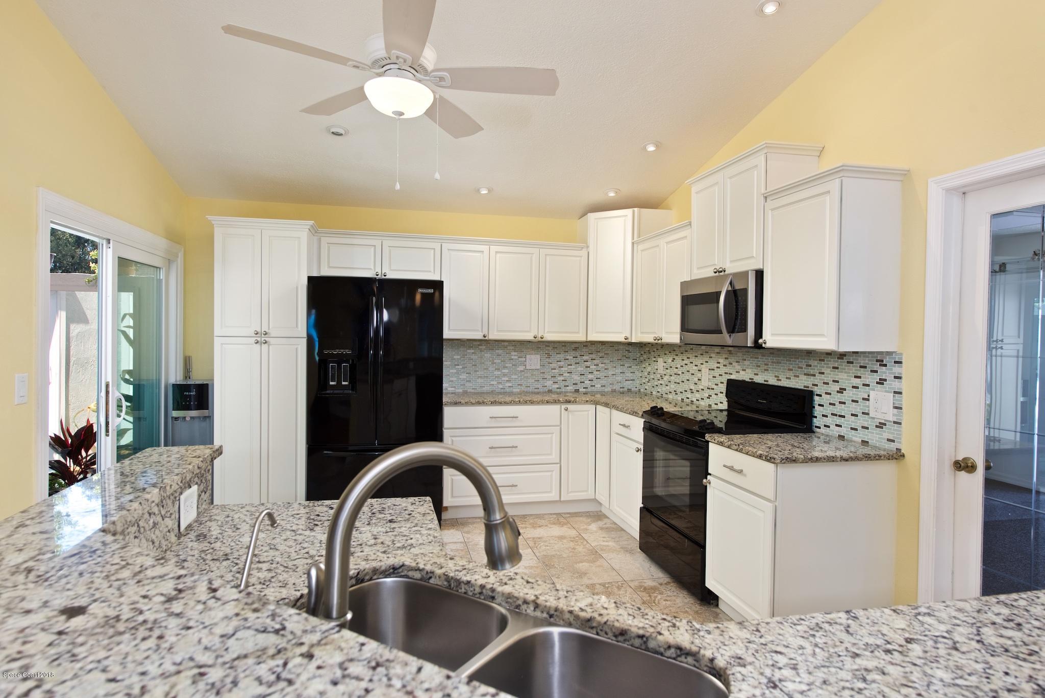 309 Pine Ridge Lane Melbourne, FL 32940 - Photo 9 of 26 Kitchen