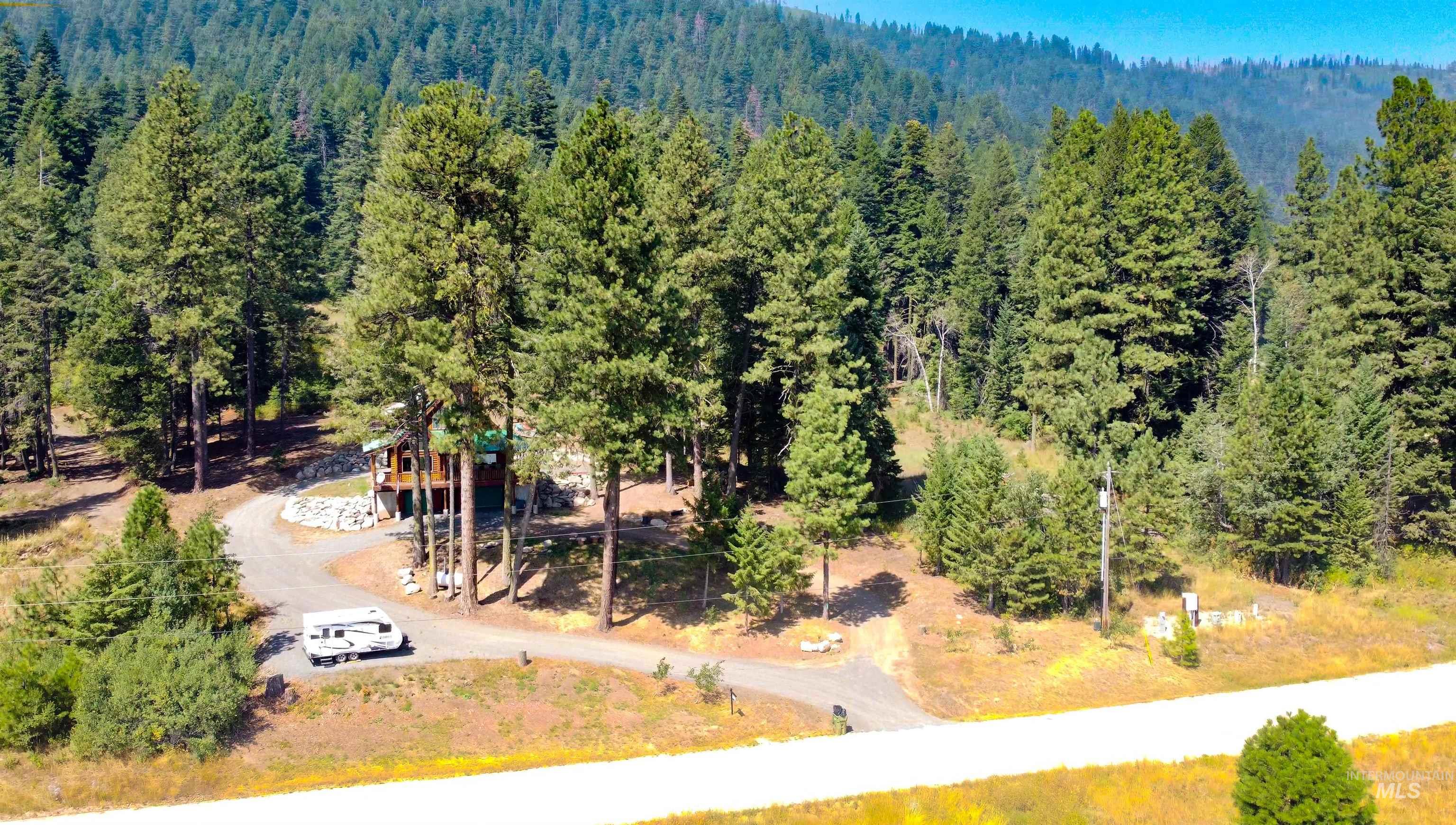 1539 West Mountain Road Cascade, ID 83611 - Photo 33 of 33 Drone / aerial view of a heavily wooded area