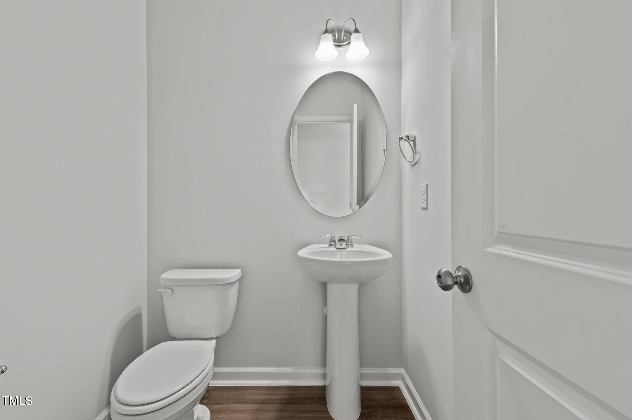 331 Devon Clfs Drive Wake Forest, NC 27587 - Photo 11 of 35 a bathroom with a toilet and a sink