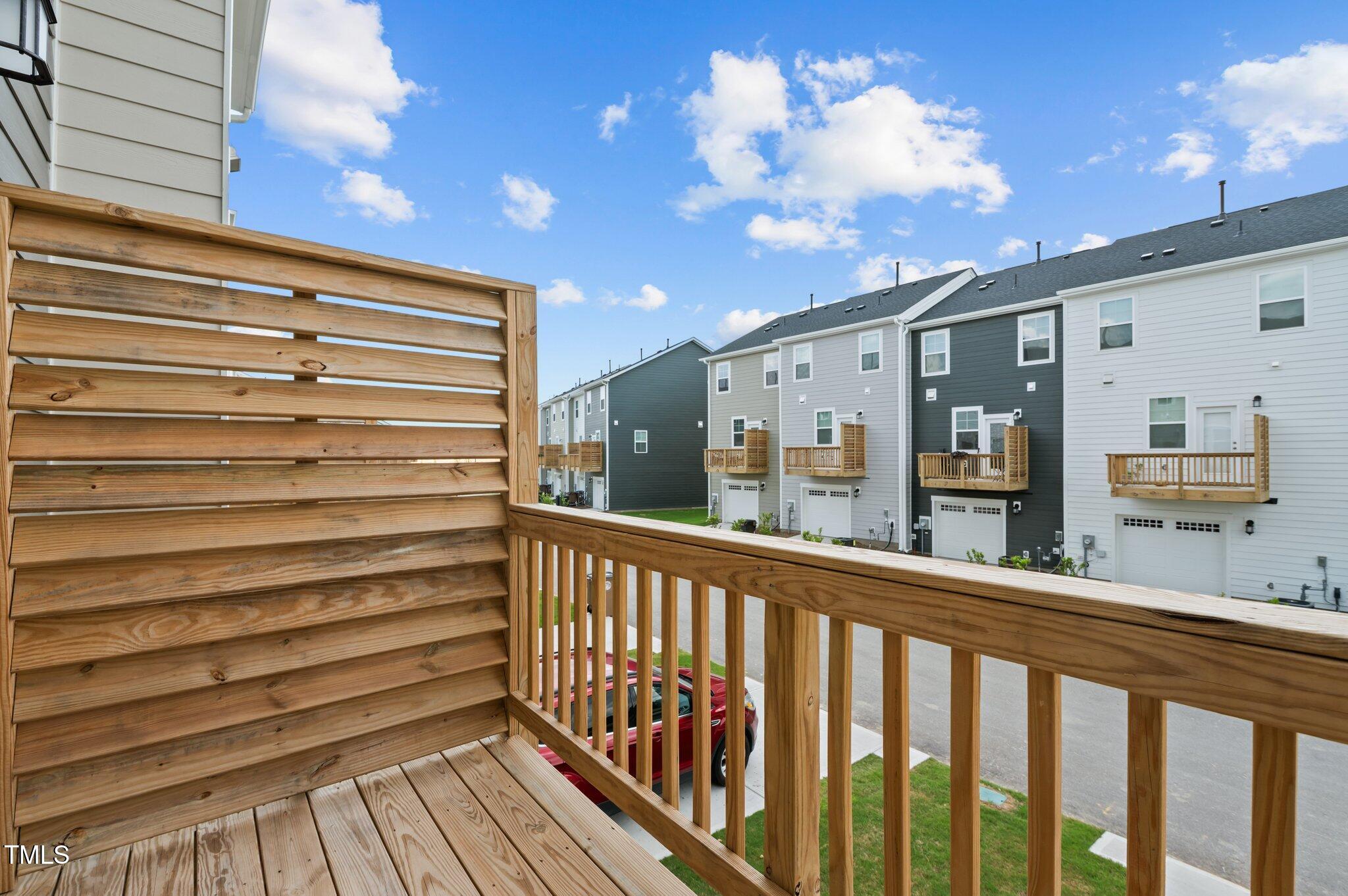331 Devon Clfs Drive Wake Forest, NC 27587 - Photo 16 of 35 a view of a porch with wooden floor and city view