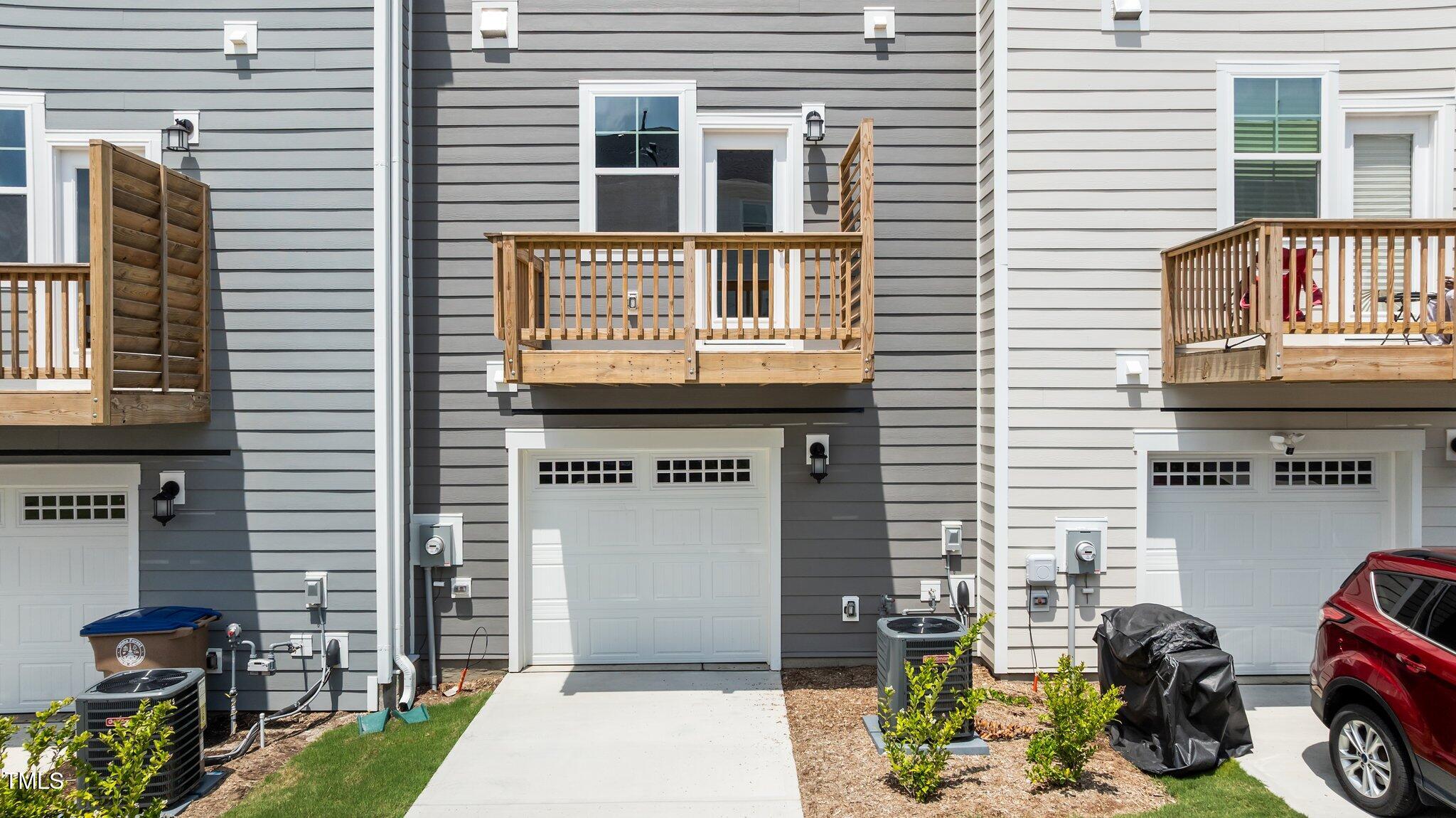 331 Devon Clfs Drive Wake Forest, NC 27587 - Photo 19 of 35 a front view of a building with outdoor seating