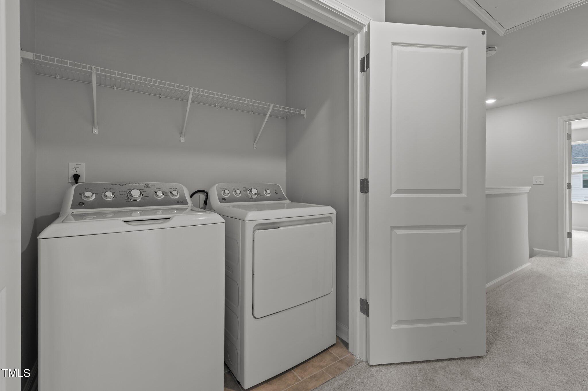 331 Devon Clfs Drive Wake Forest, NC 27587 - Photo 32 of 35 a utility room with dryer and washer