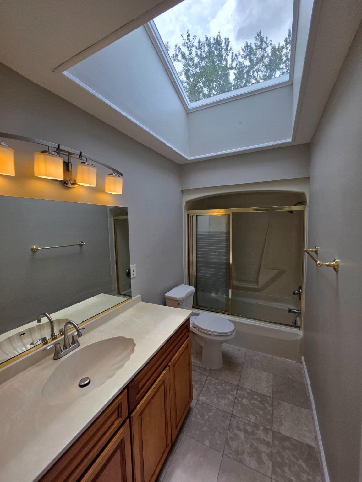 5915 Charnwood Road Catonsville, MD 21228 - Photo 10 of 21 Upper level full bath w/ skylight