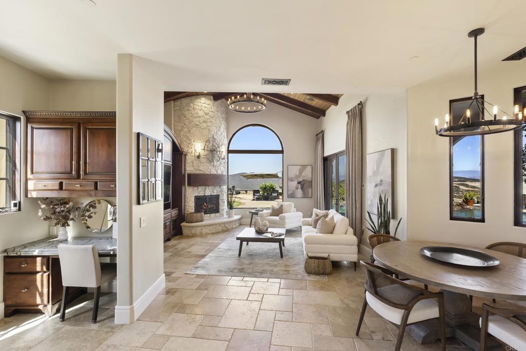 18320 Via Ambiente Rancho Santa Fe, CA 92067 - Photo 13 of 59 a living room with furniture and a window