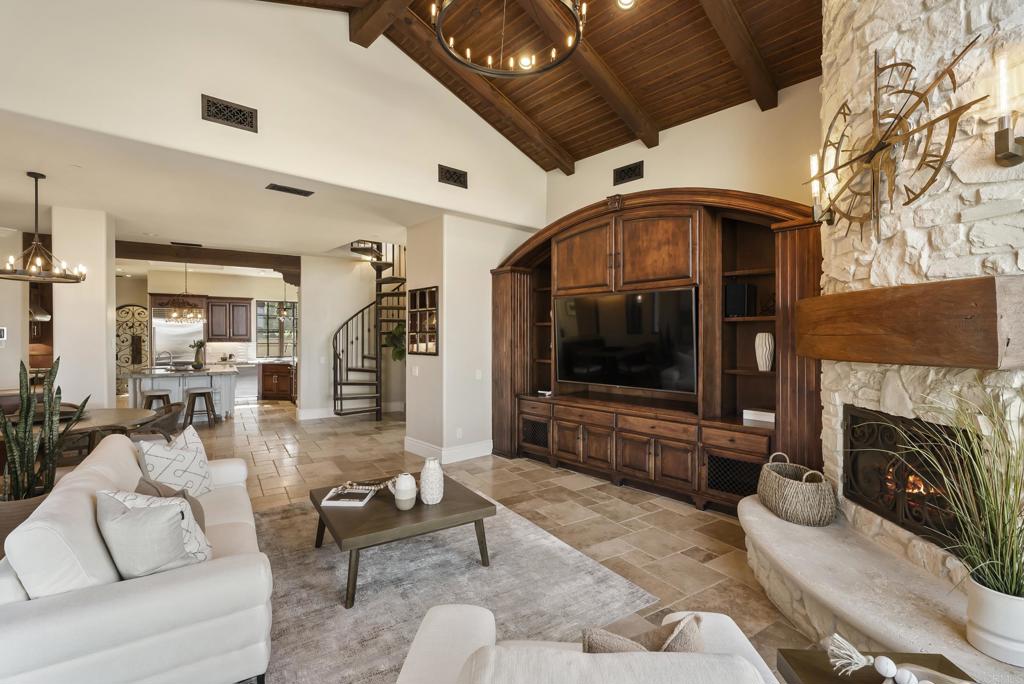 18320 Via Ambiente Rancho Santa Fe, CA 92067 - Photo 17 of 59 a living room with furniture and a flat screen tv