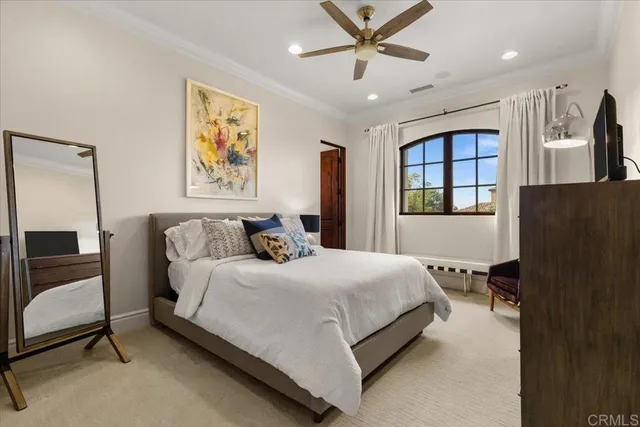a living room with furniture a chandelier and a chandelier