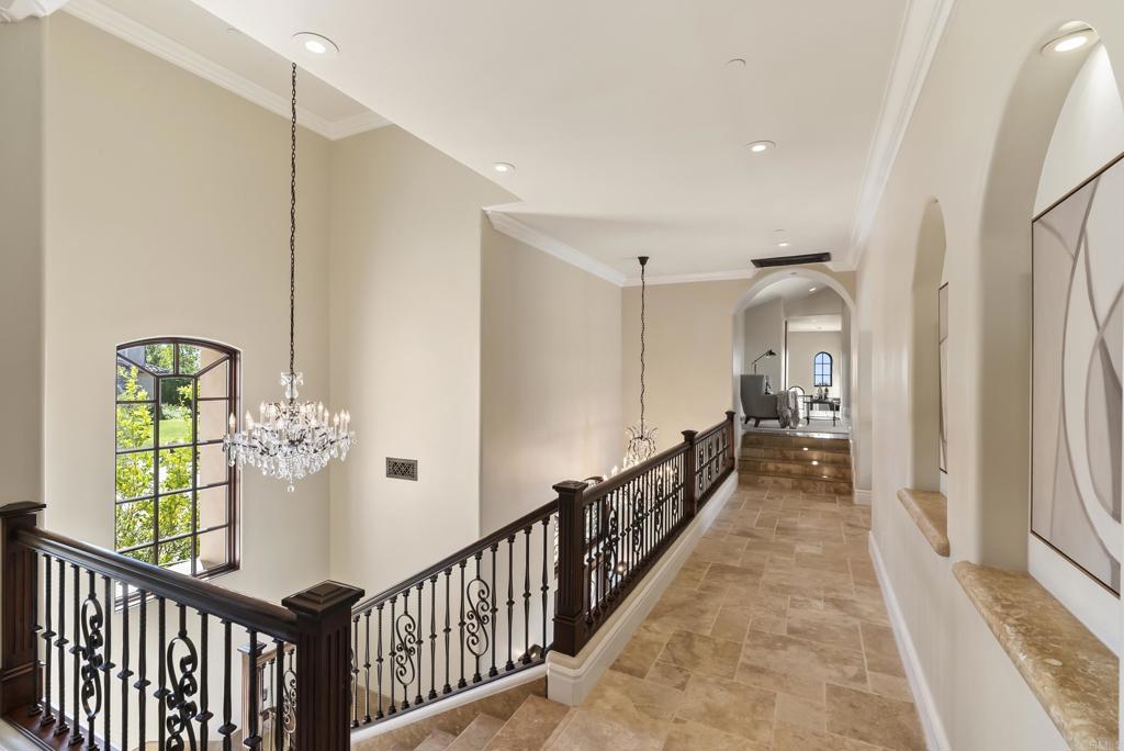 18320 Via Ambiente Rancho Santa Fe, CA 92067 - Photo 34 of 59 a view of a hallway view with staircase