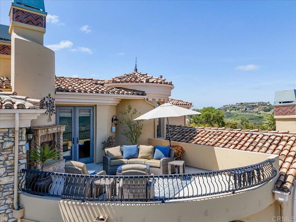 18320 Via Ambiente Rancho Santa Fe, CA 92067 - Photo 38 of 59 a view of a chairs and table in the roof deck