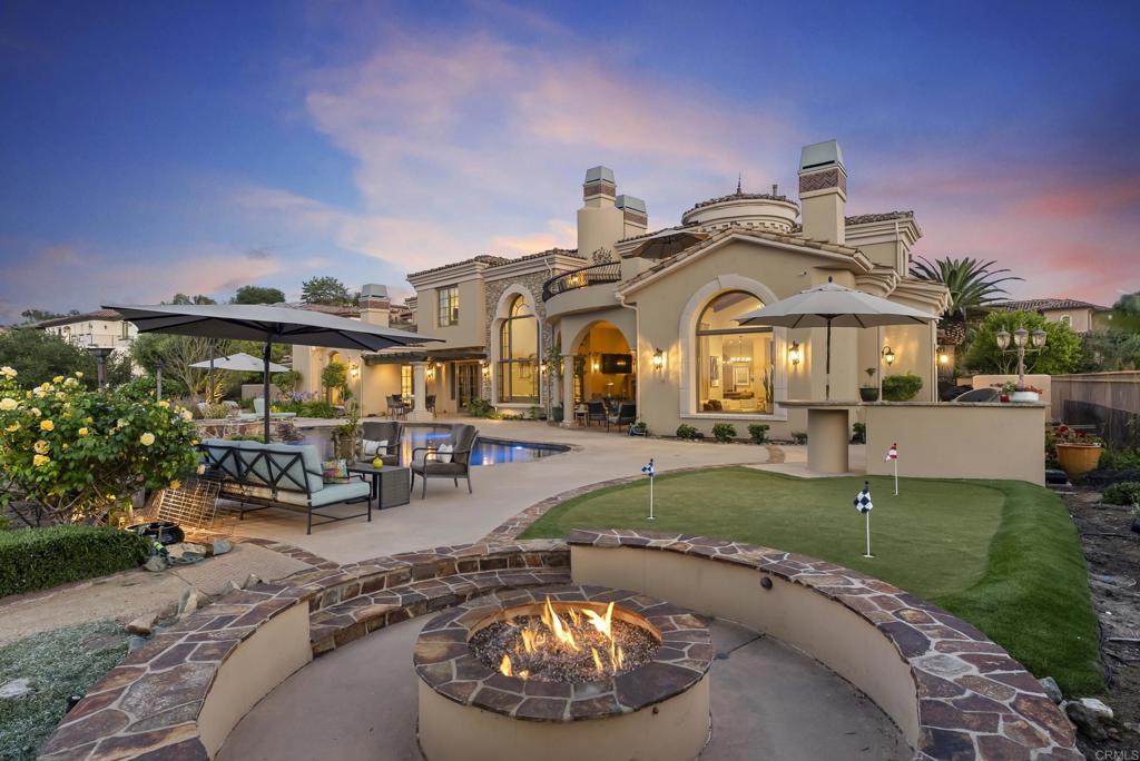 18320 Via Ambiente Rancho Santa Fe, CA 92067 - Photo 45 of 59 a view of a house with outdoor space and sitting area