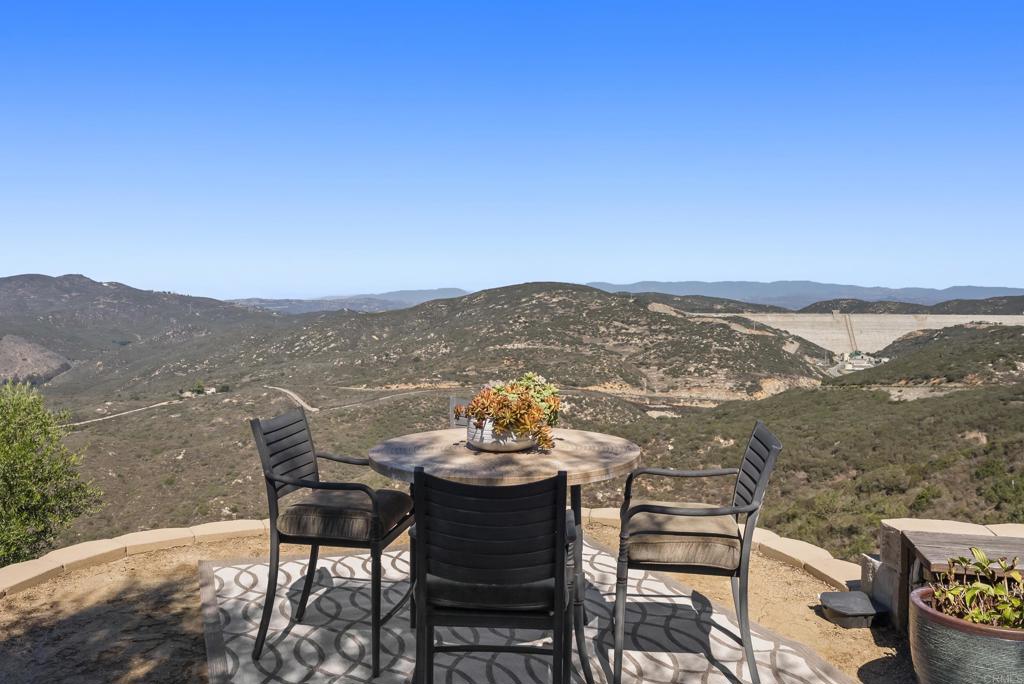 18320 Via Ambiente Rancho Santa Fe, CA 92067 - Photo 51 of 59 a view of a chairs and table in the terrace
