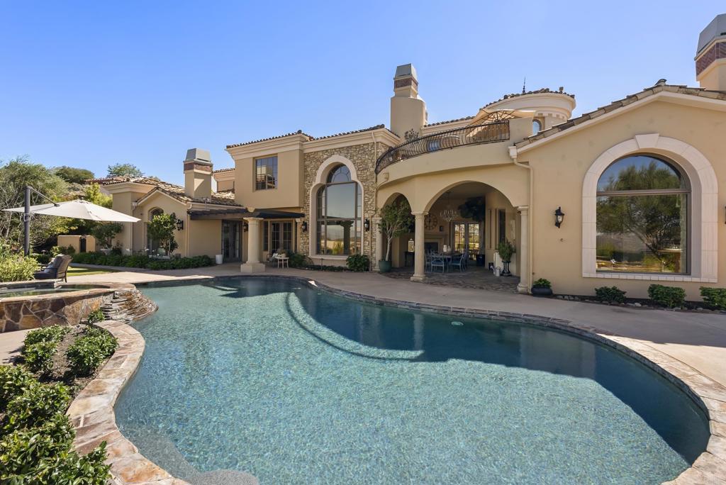 18320 Via Ambiente Rancho Santa Fe, CA 92067 - Photo 55 of 59 a front view of a house with a yard